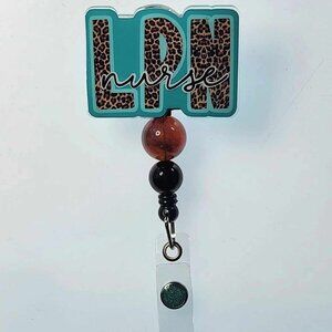 Badge Reel, LPN, Licensed Practical Nurse (swivel alligator clip)